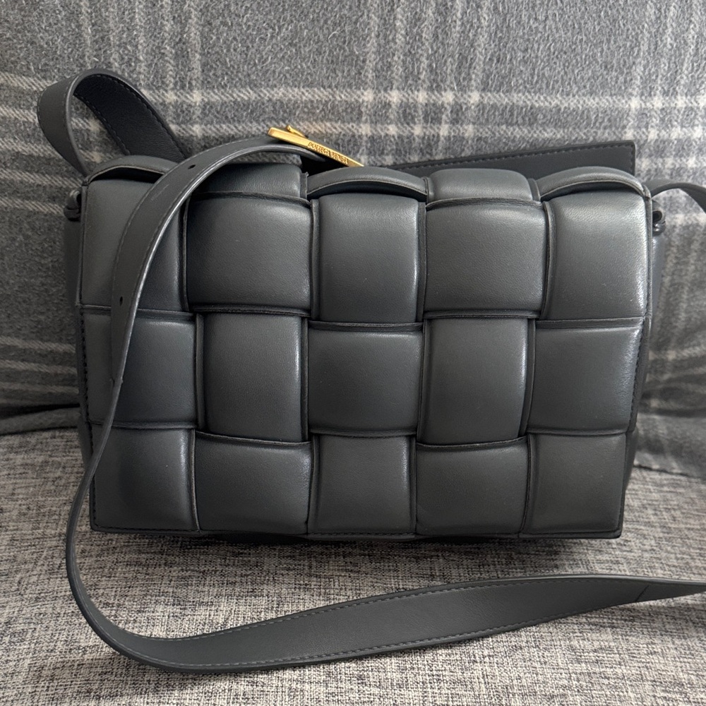 Bottega Veneta Gray Padded Casette Bag with Gold Accents